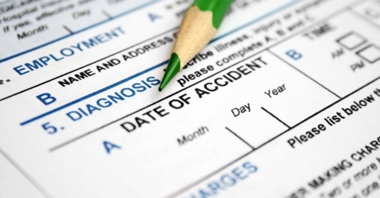 close up image of a car crash report